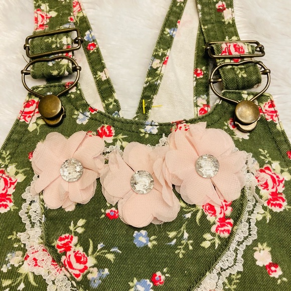 Adorable little girls green and floral overall shorts. - Picture 2 of 5